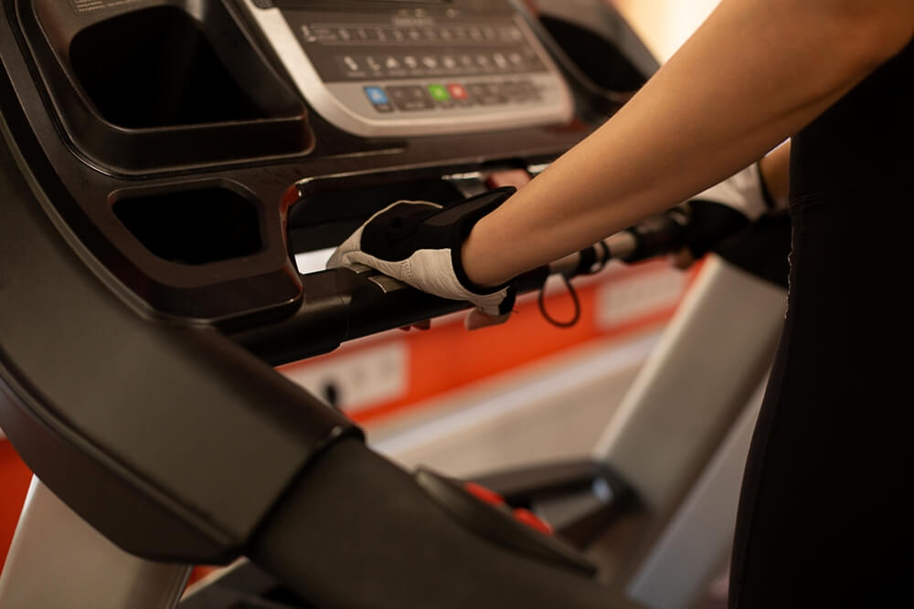 Person Working Out on one of the Best Folding Treadmills to save space