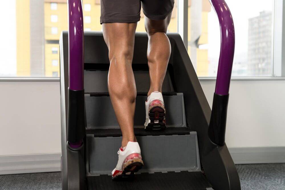 A person walking on a stair treadmill