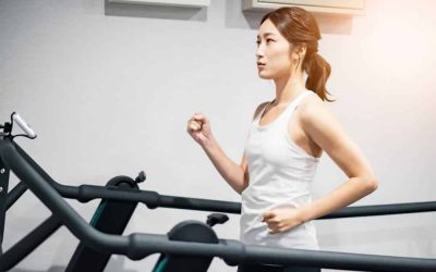 Asian Woman Walking on the Best Manual Treadmill