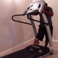 One Person struggling on How to Take Apart a Proform Treadmill